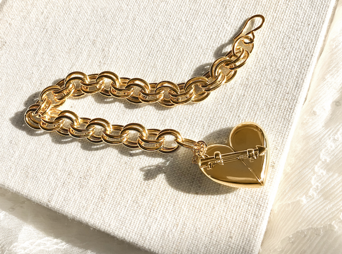 Shown here: Our Heart + Arrow Bracelet which can store your personal notes of gratitude.